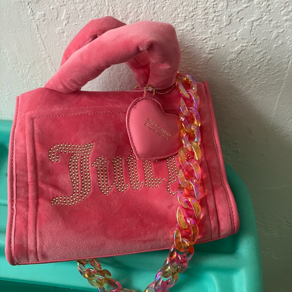 New juicy couture just not wt tags. . Never has been worn.